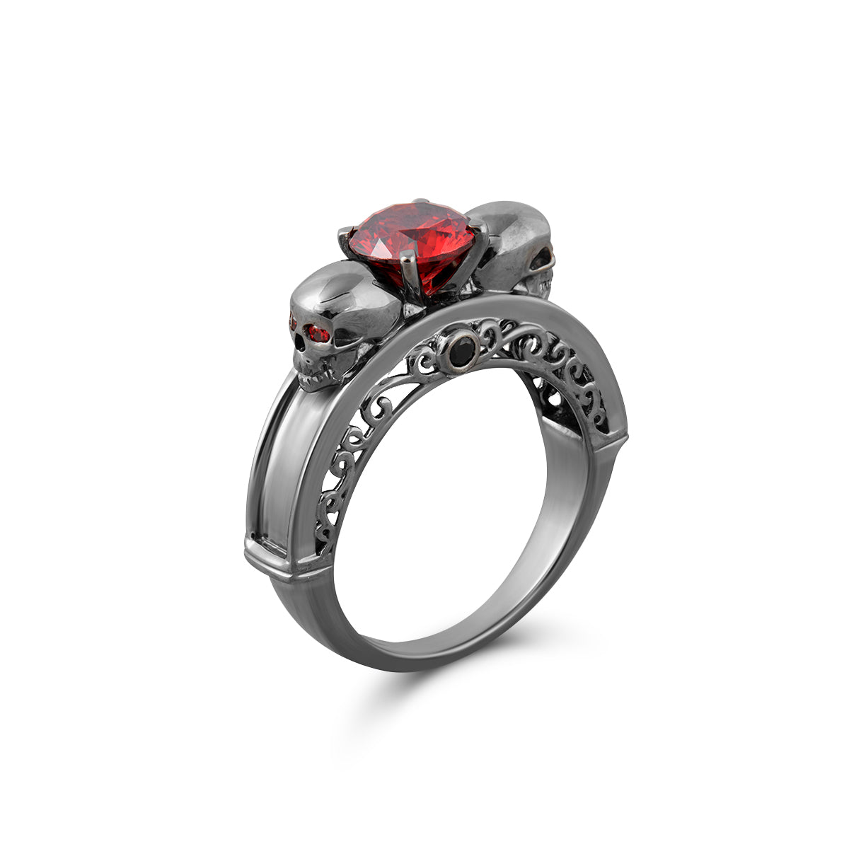 Silver skull ring with red garnet gemstone and filigree design