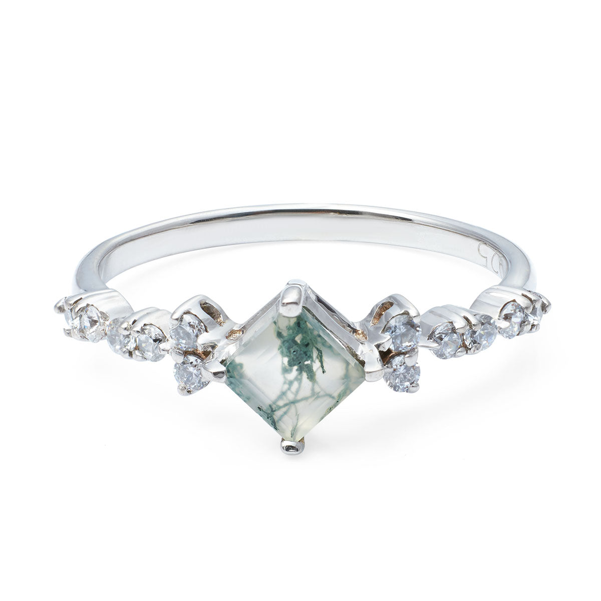 Silver ring with a kite-cut moss agate center stone and small white accent gems on the band.
