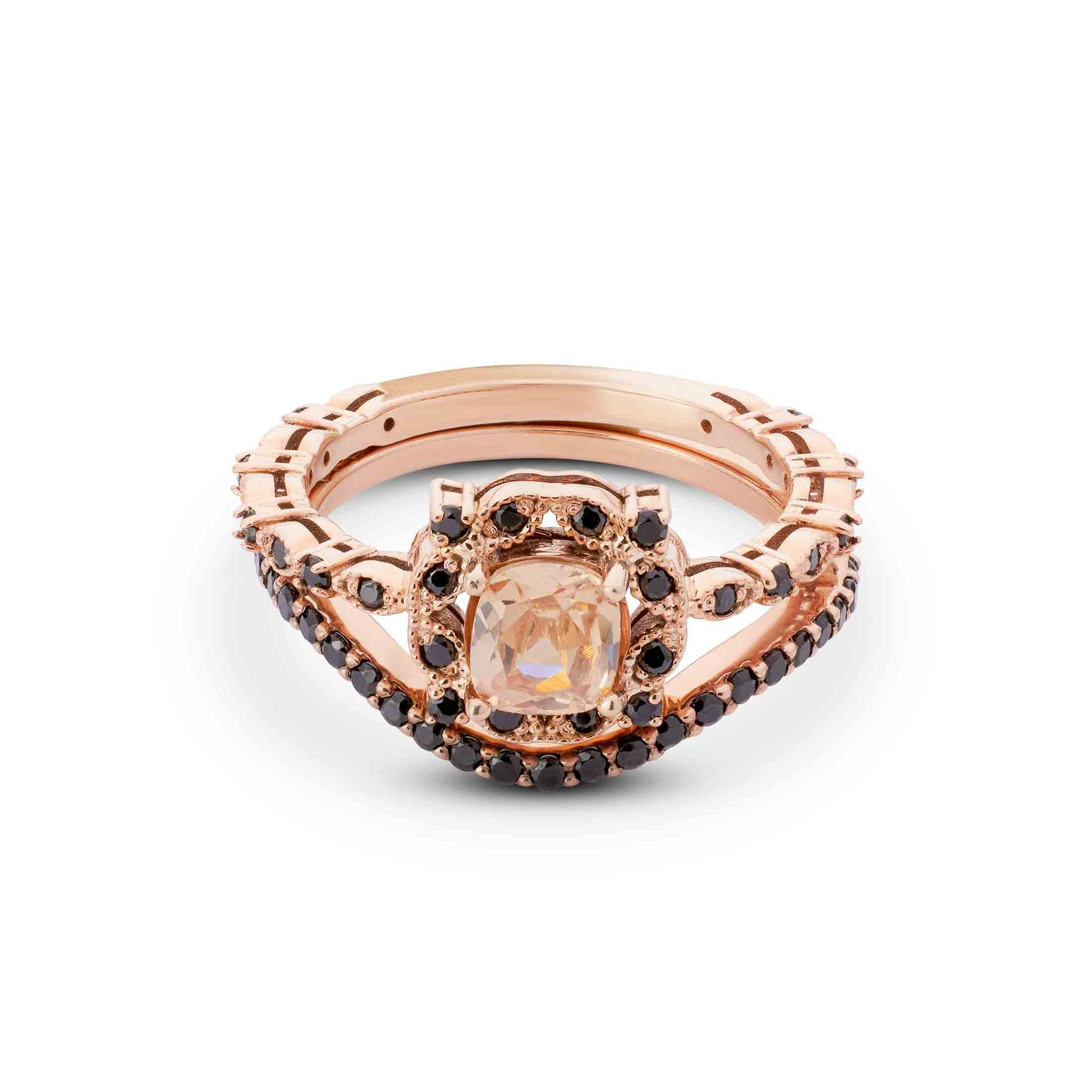 Engagement set with a champagne sapphire and a curved black diamond wedding band.