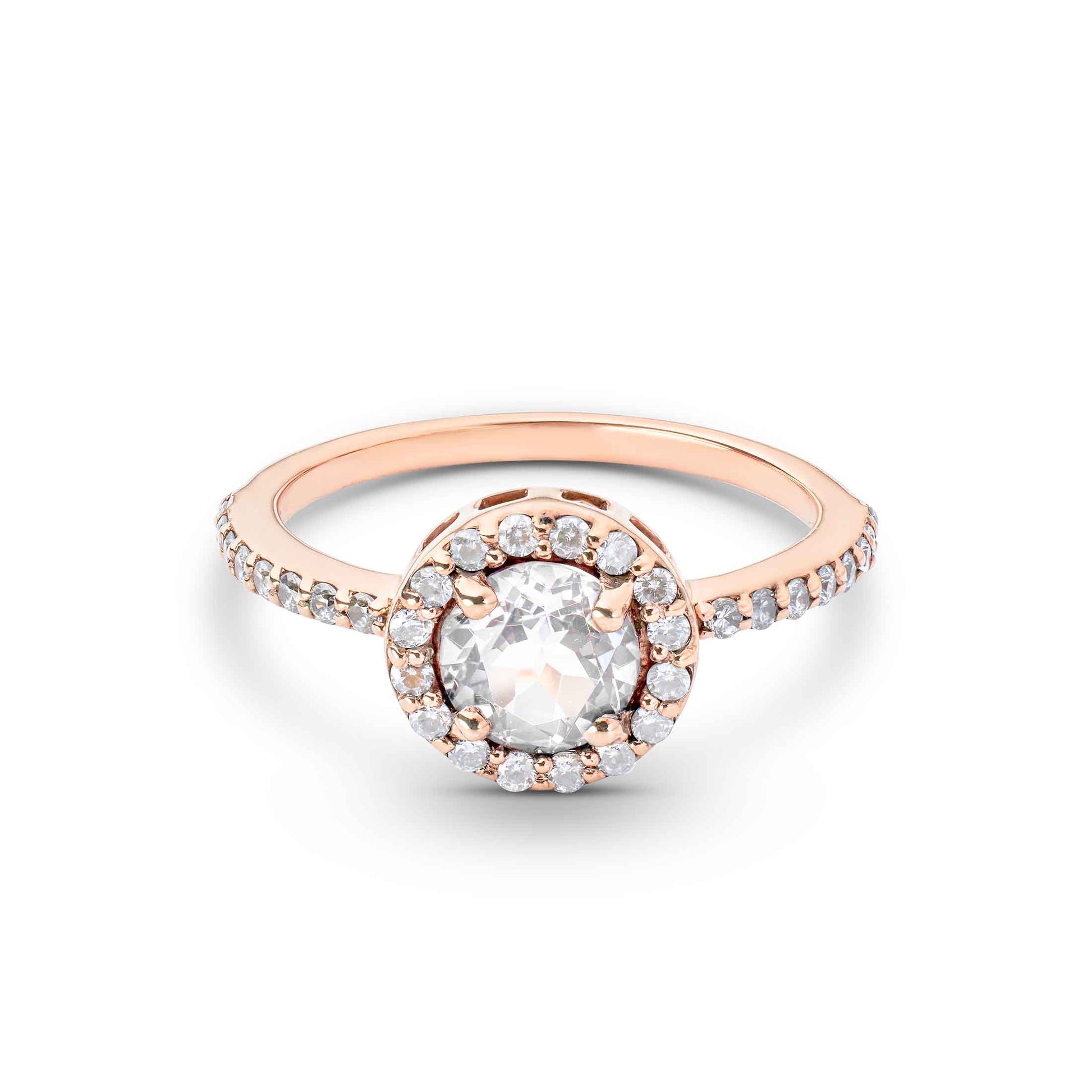 Round center stone surrounded by a diamond halo on a thin rose gold band with pavé accents.