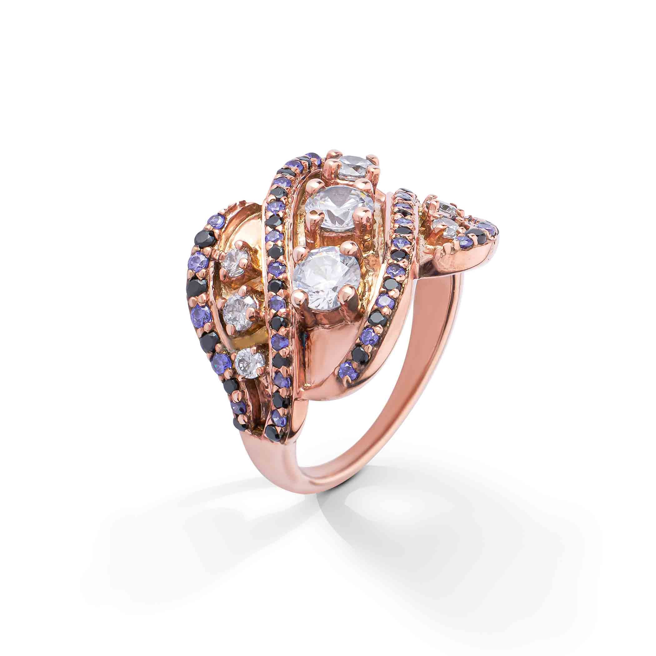 Engagement  rose gold ring showcasing a blend of clear, violet, and dark gems in a layered pattern.