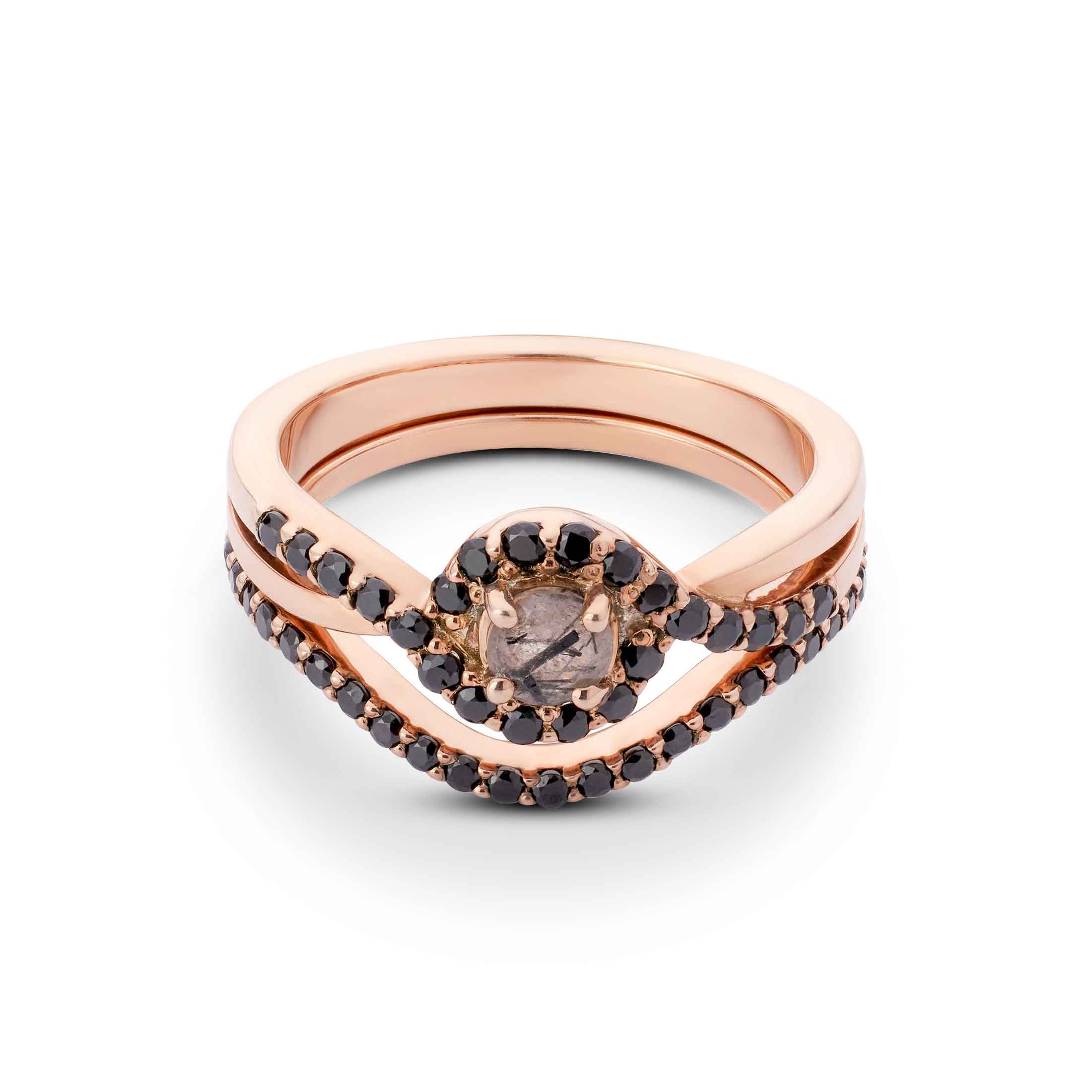 Bridal set with a salt and pepper diamond halo and a curved black diamond band.