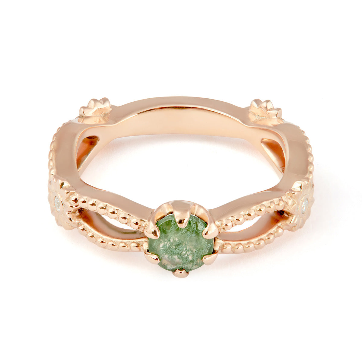 Rose gold ring with an infinity, beaded band and a central round green moss agate stone held by six claw prongs.
