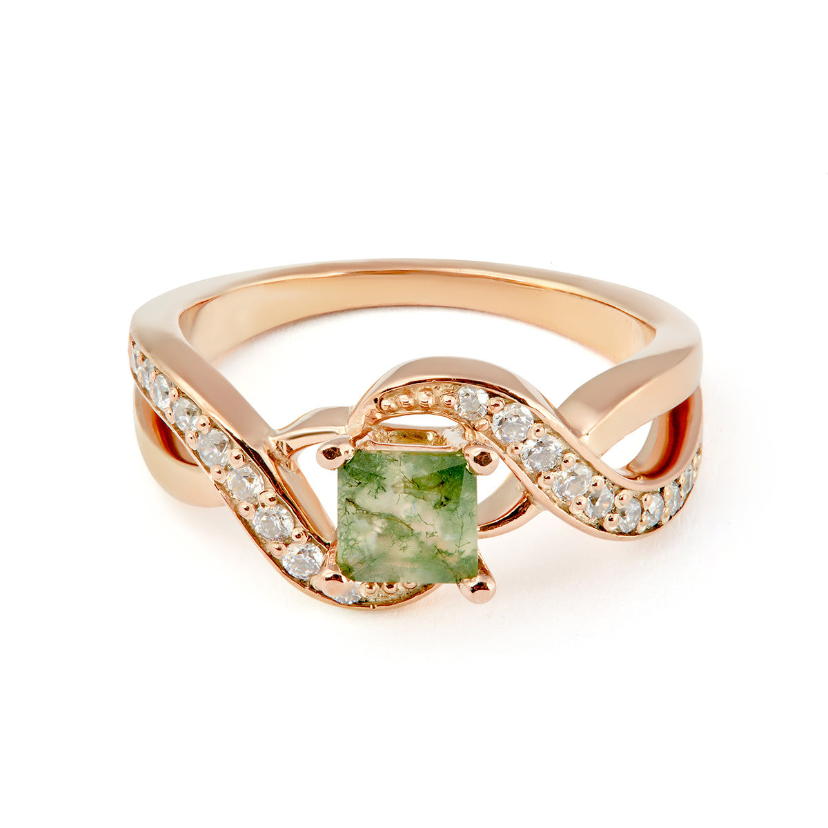 Rose gold ring with a square moss agate center stone and a diamond-studded bypass band.
