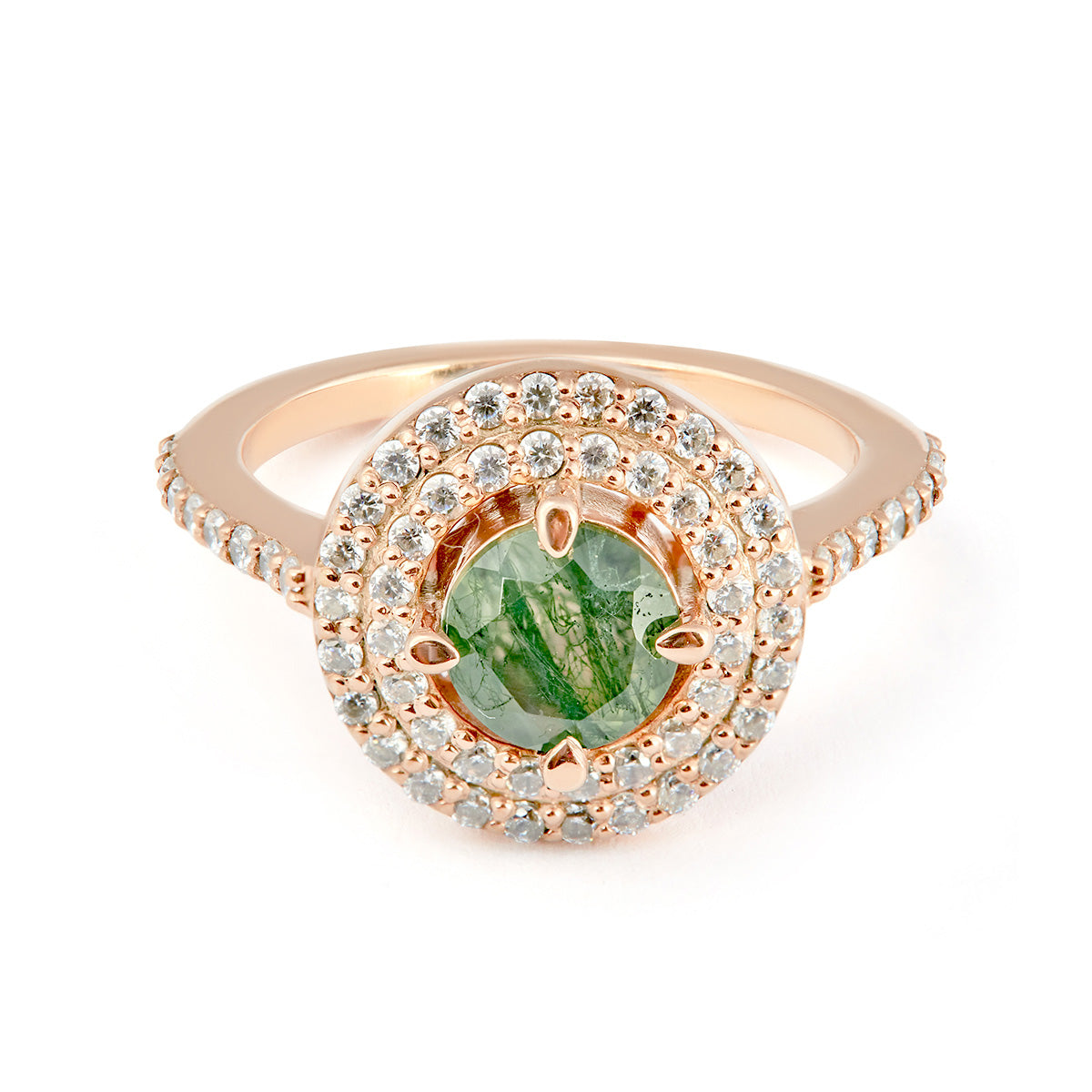 Rose gold ring with green gemstone and diamond accents on a white background