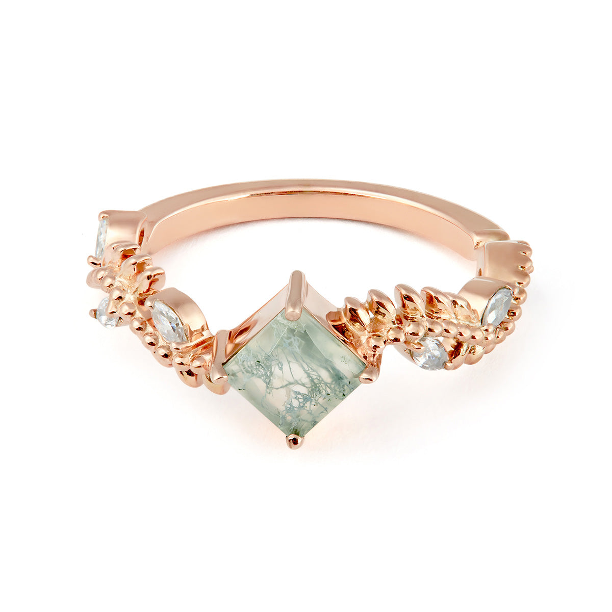 Rose gold ring featuring a kite-cut moss agate center stone and a nature-inspired vine band.