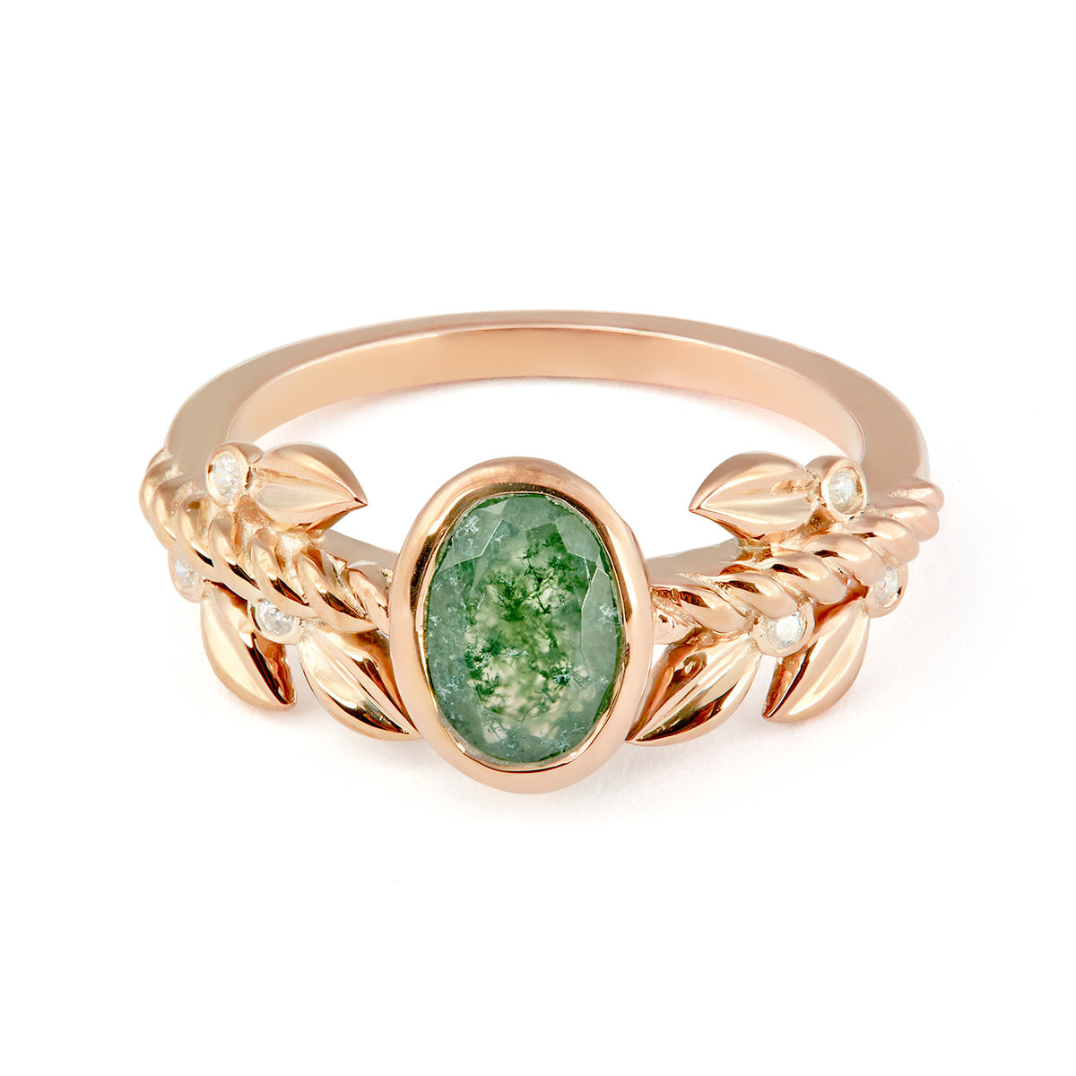 Nature-inspired rose gold engagement ring with a mossy green oval stone and delicate leaf motifs.