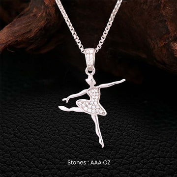 Silver ballerina pendant necklace with Cubic Zirconia Diamonds on a dark textured background