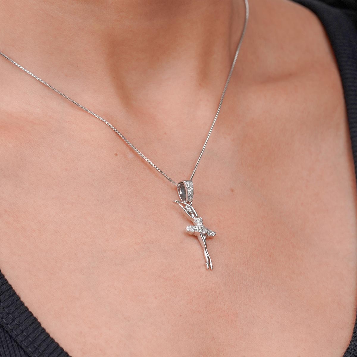 Minimalist Ballerina pendant necklace on a girl's neck