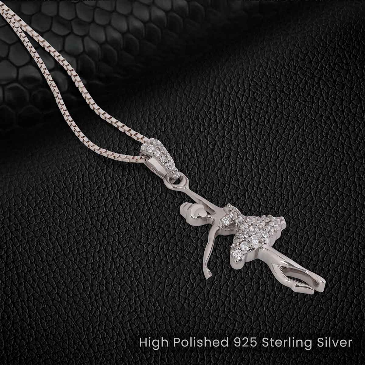 Ballerina necklace with a detailed ballet dancer silhouette pendant on a black textured background