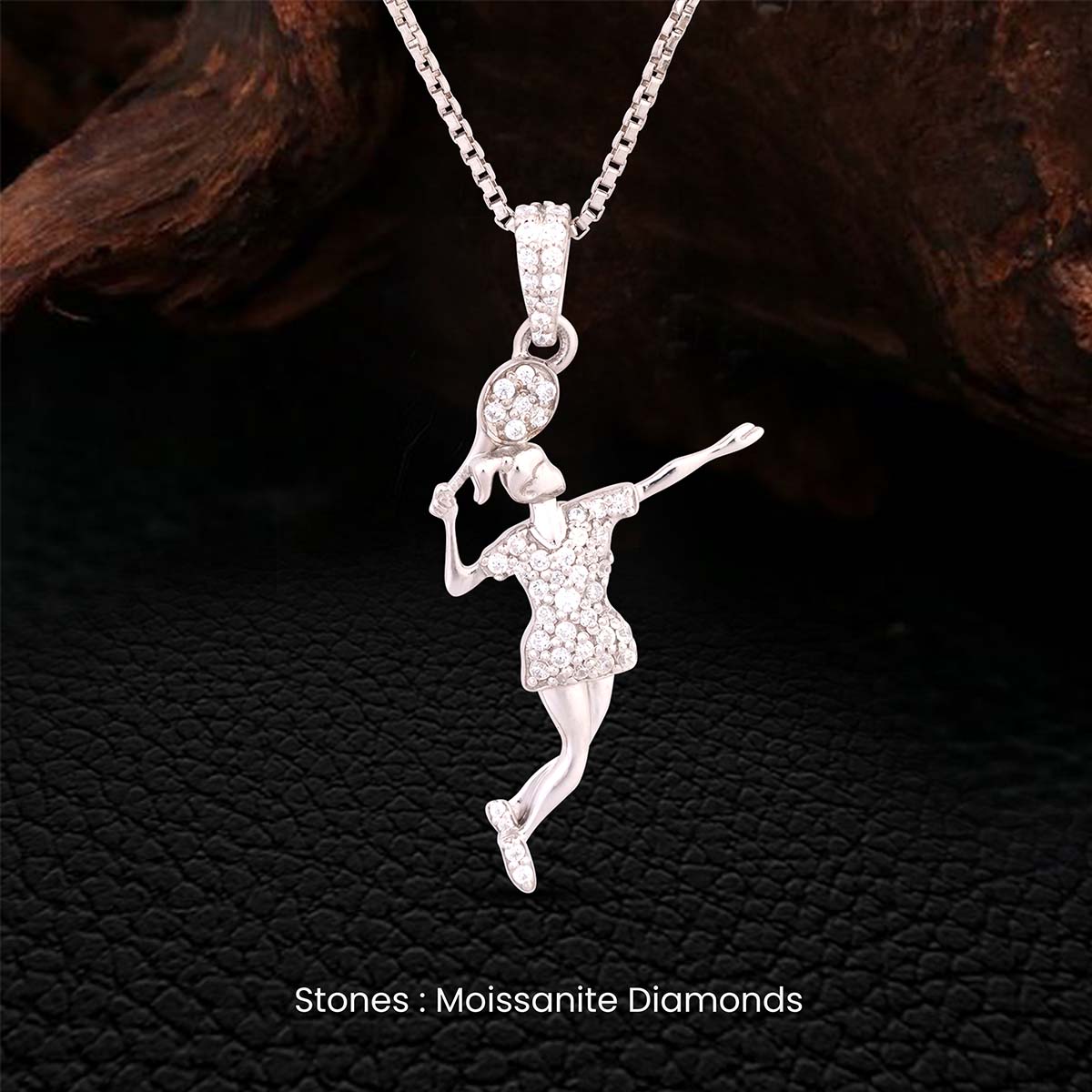 Female badminton player pendant necklace with moissanite diamonds on a dark background