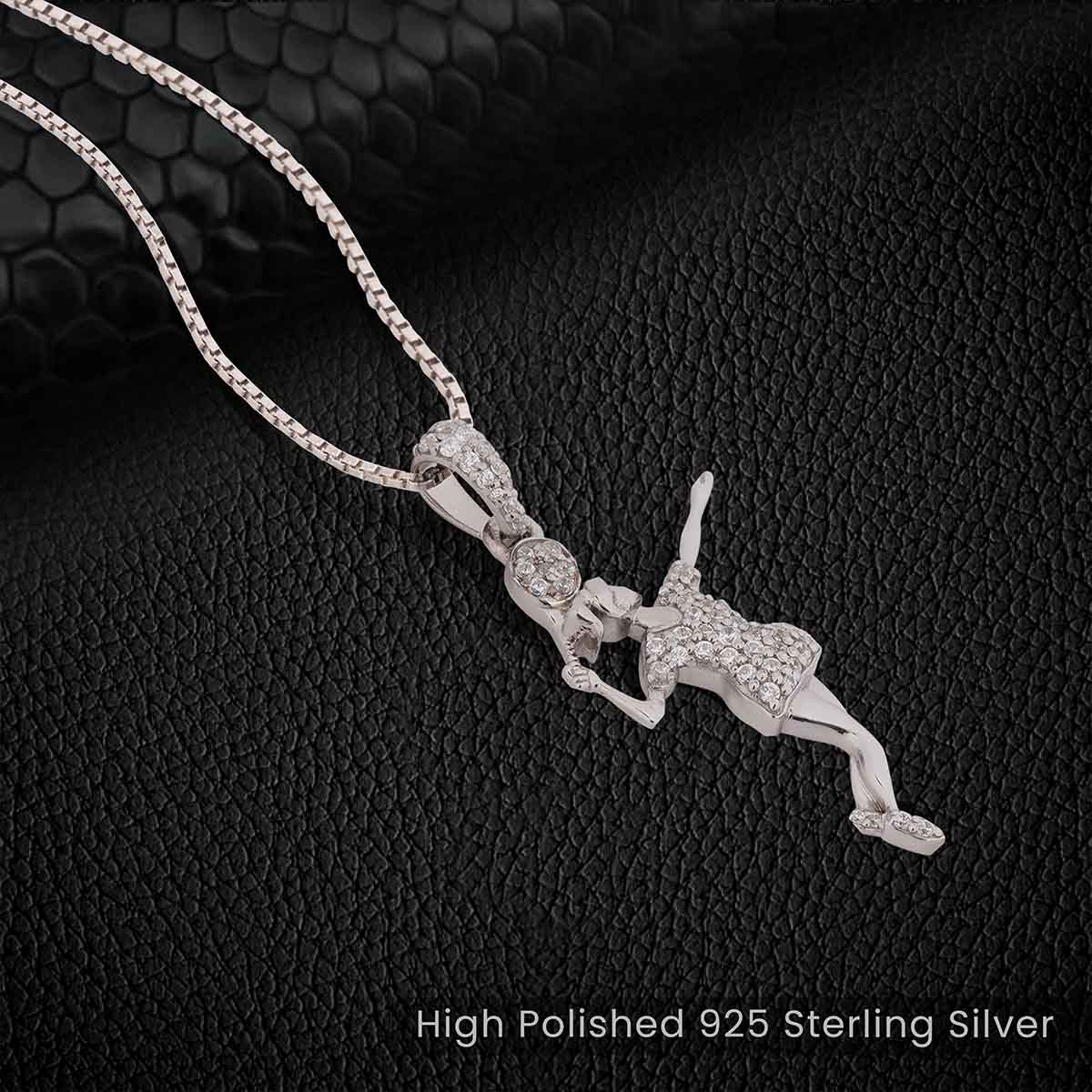 Sterling Silver pendant of a badminton player on a dark textured background