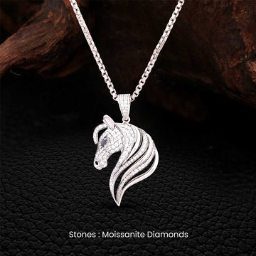 Sterling Silver horse head pendant necklace with moissanite diamonds on a dark textured background
