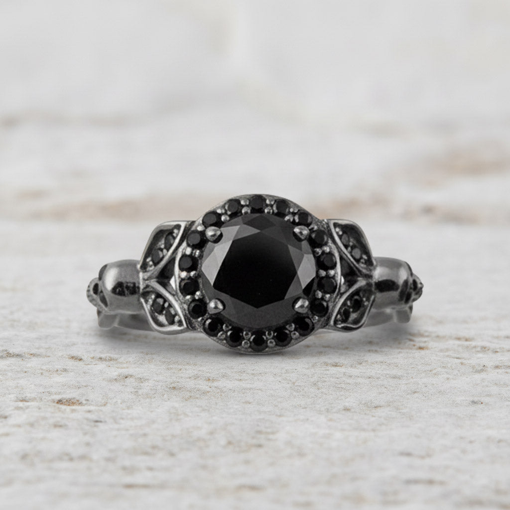 Black skull ring with leaf design in sterling silver with gun metal finish