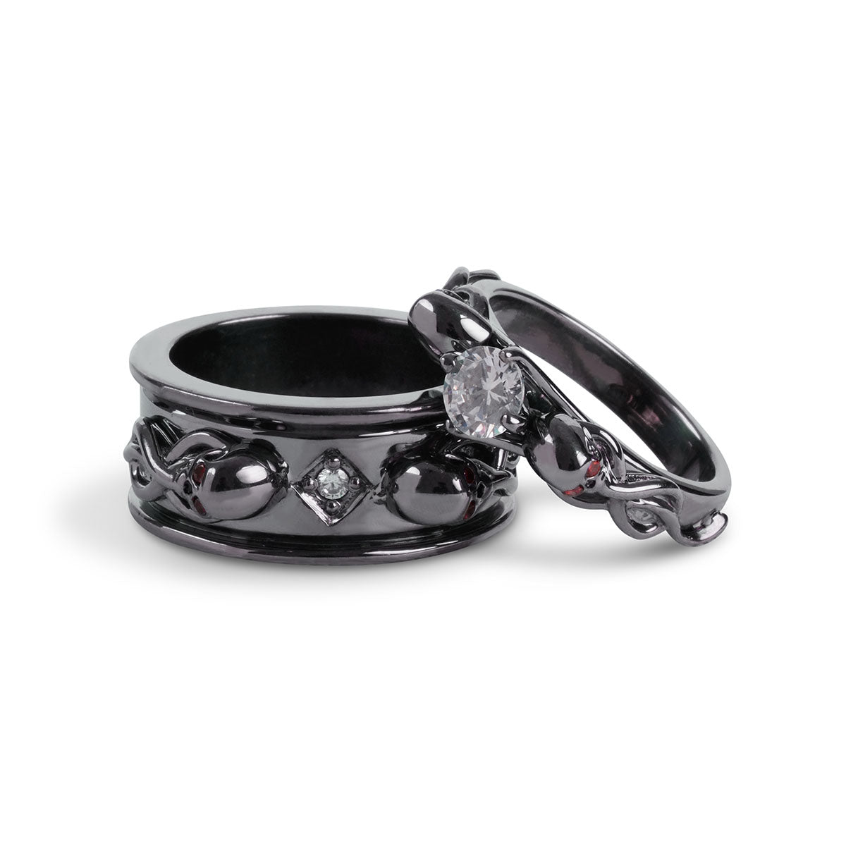 Matching black skull couple rings with diamonds set in gun metal finished sterling silver