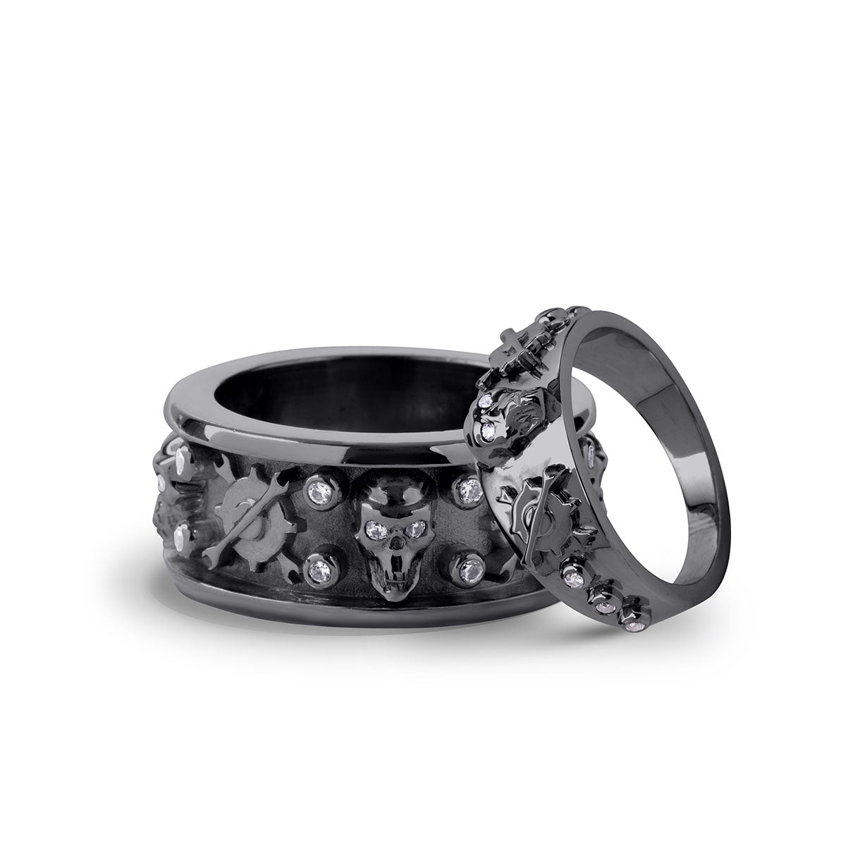 Black skull couple wedding bands with mechanical elements crafted in gun metal finished sterling silver
