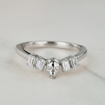 Handmade skull wedding ring in solid sterling silver with luxury nesting silhouette and moissanite sparkle