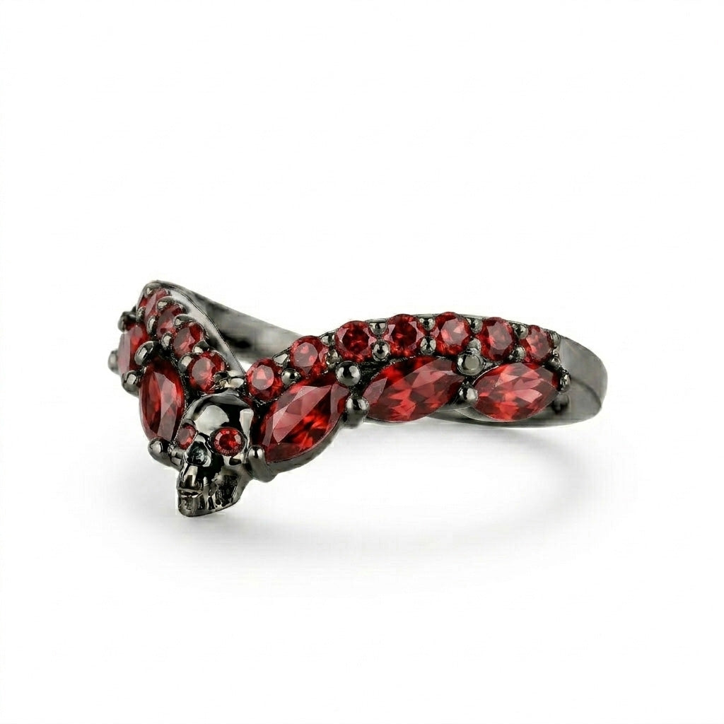 Macabre wishbone nesting ring in dark gunmetal sterling silver accented with vibrant red garnet cubic zirconia stones