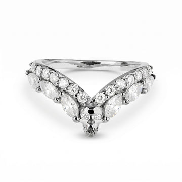 Sterling silver V-shaped chevron ring enhancer with diamonds and a central skull, a classic yet gothic style wedding band choice.
