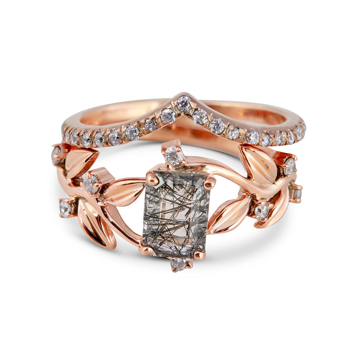 Engagement ring with a rectangular black rutilated quartz and diamond accents.