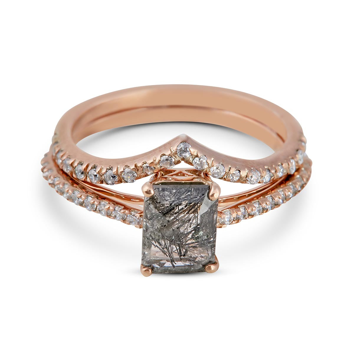 Rose gold ring with a large diamond and smaller diamonds on a white background