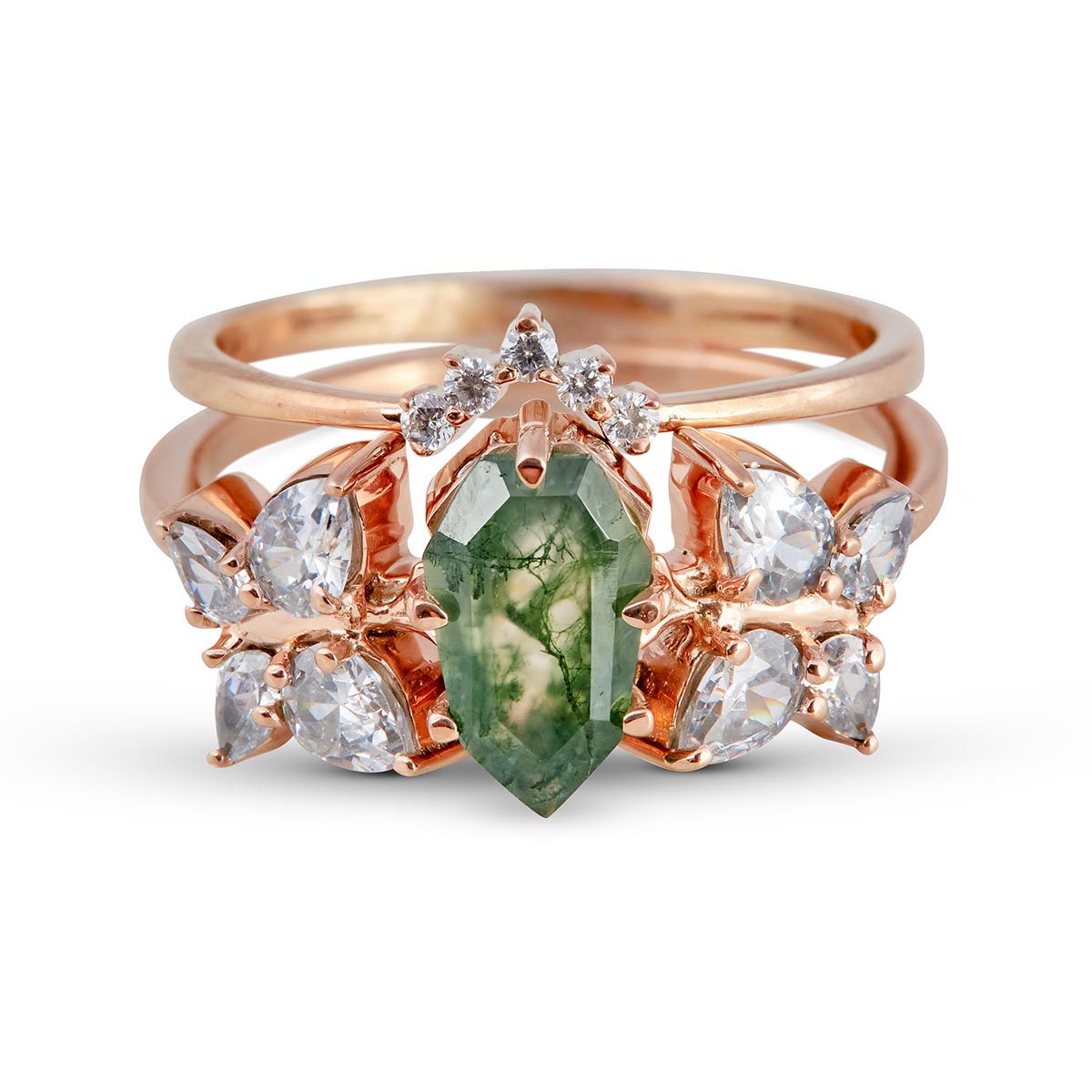 Coffin-cut moss agate center stone and pear-cut diamond side stones.