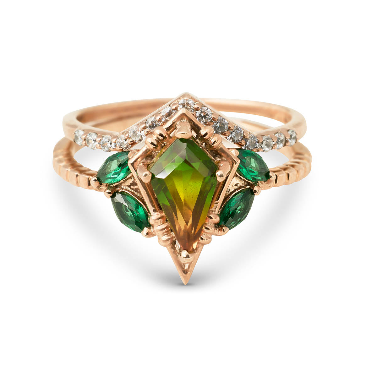 Bridal set featuring a kite-cut peridot ring paired with a curved diamond chevron band.