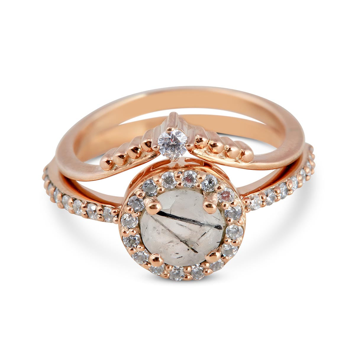 Modern rose gold ring with a circular rutilated quartz center stone and sparkling diamond pavé.
