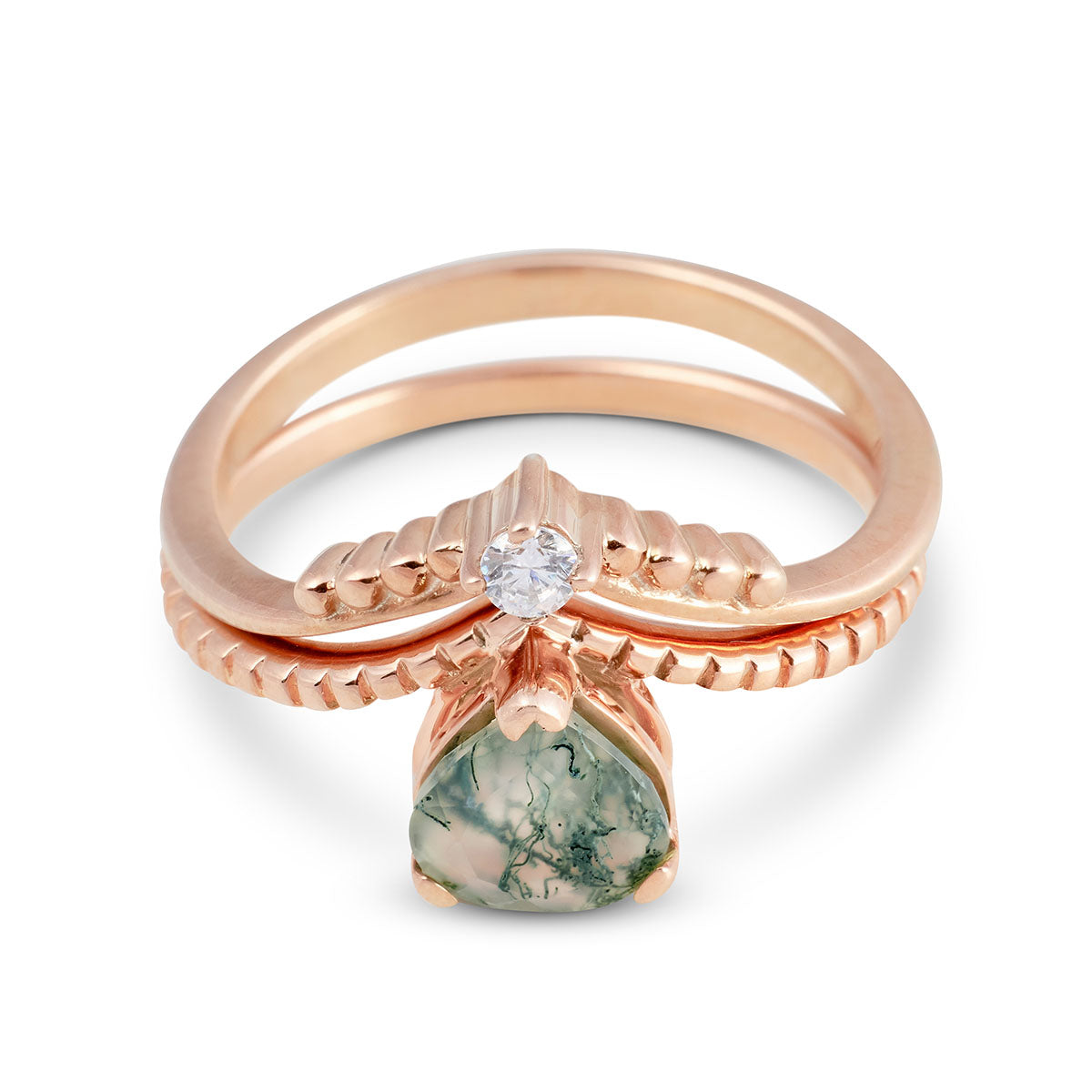 Moss agate engagement ring in rose gold with a matching V-shaped band and a small round diamond.