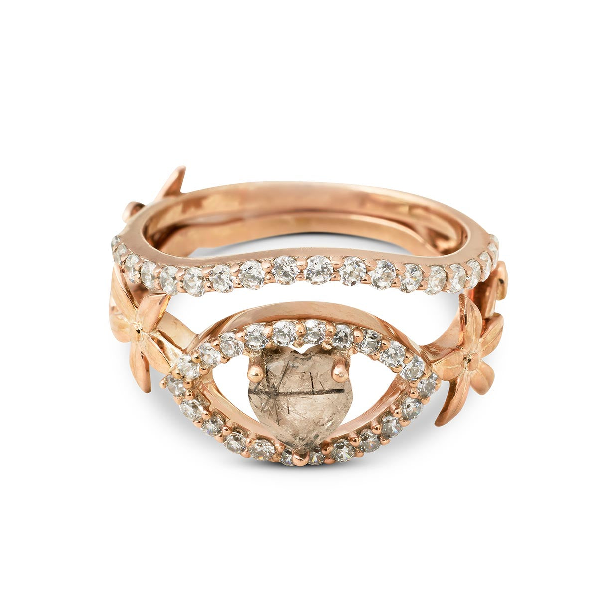 Whimsical rose gold jewelry featuring botanical details and a salt-and-pepper rutilated quartz.