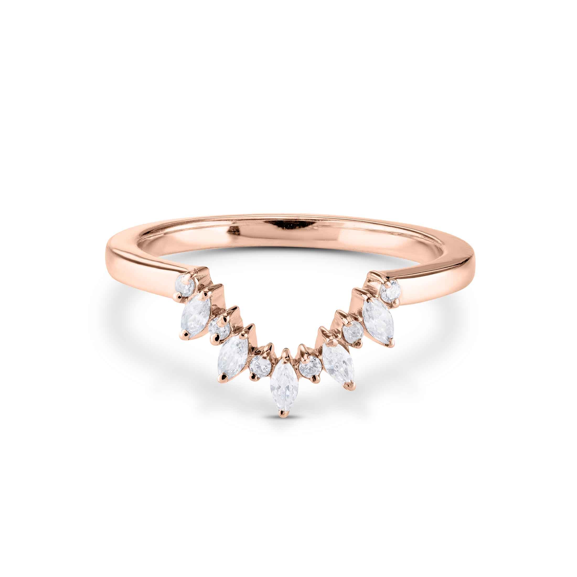 Bohemian rose gold stacking band with a curved, multi-stone marquise diamond design.