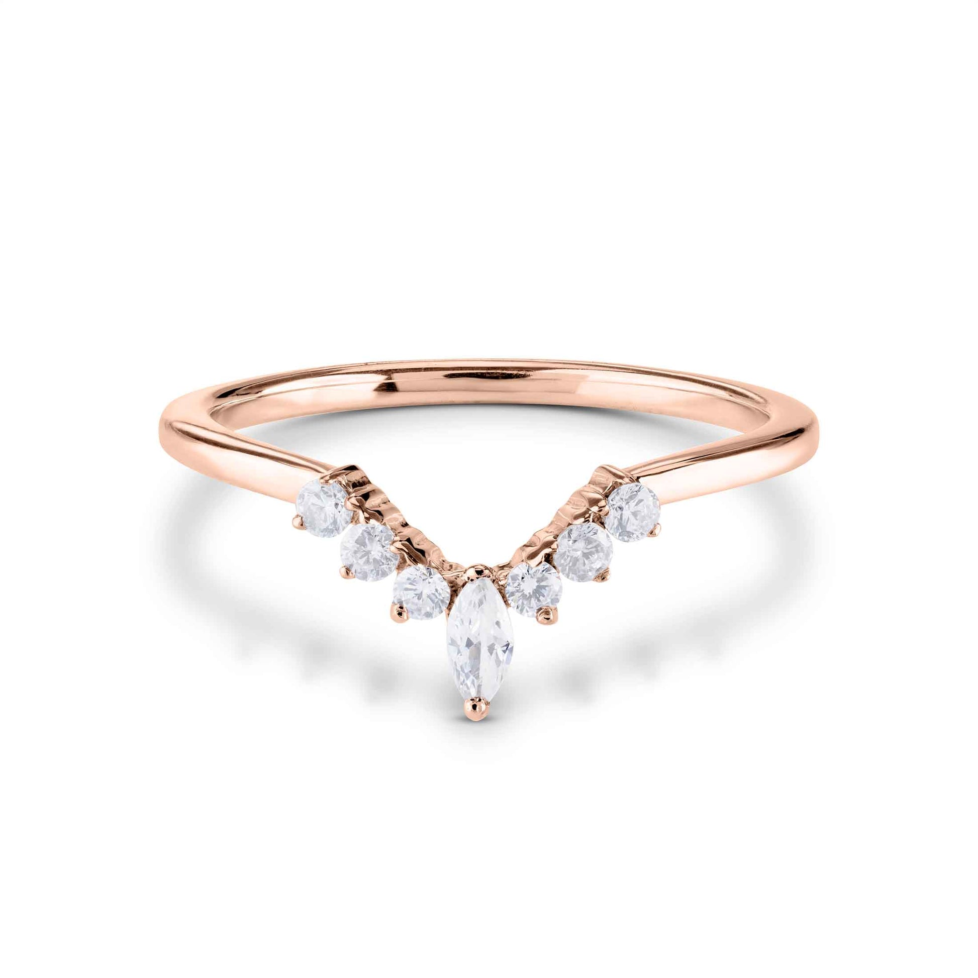 Rose gold ring with diamonds on a white background