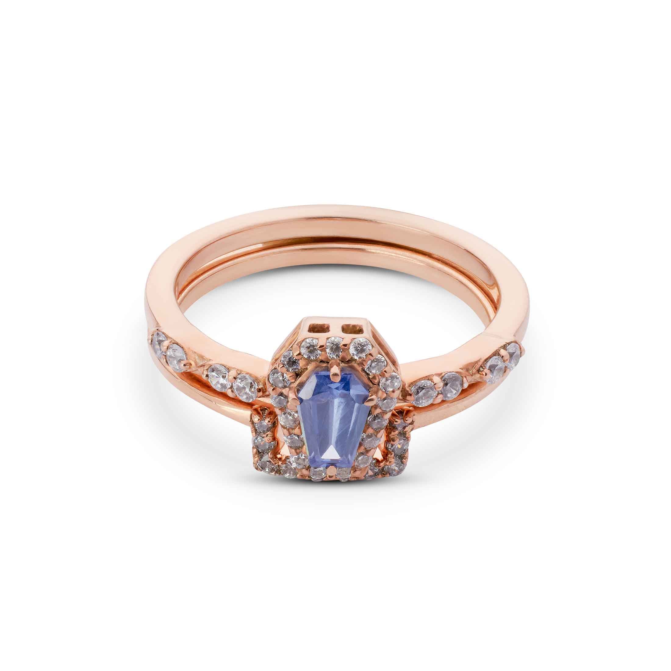 Two-piece rose gold ring set featuring a purple coffin gem and nested sparkling diamond halos.