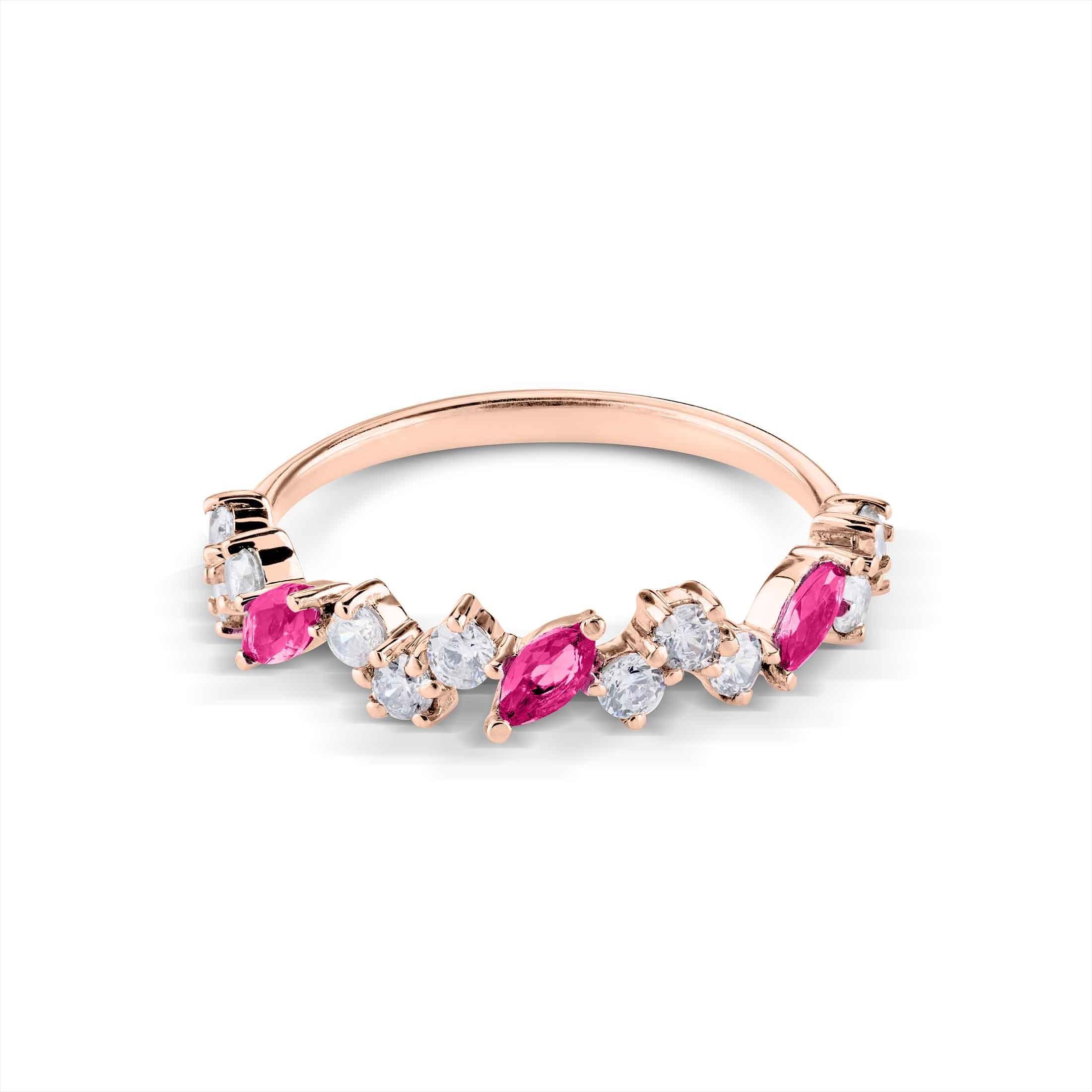 A pink sapphire and diamond scatter band in rose gold, featuring marquise and round-cut stones.