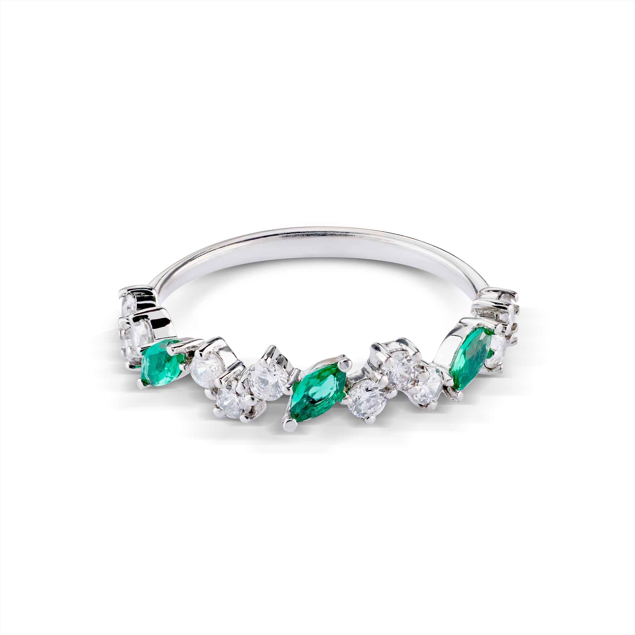 An emerald and diamond scatter band in rose gold, featuring marquise and round-cut gemstones.