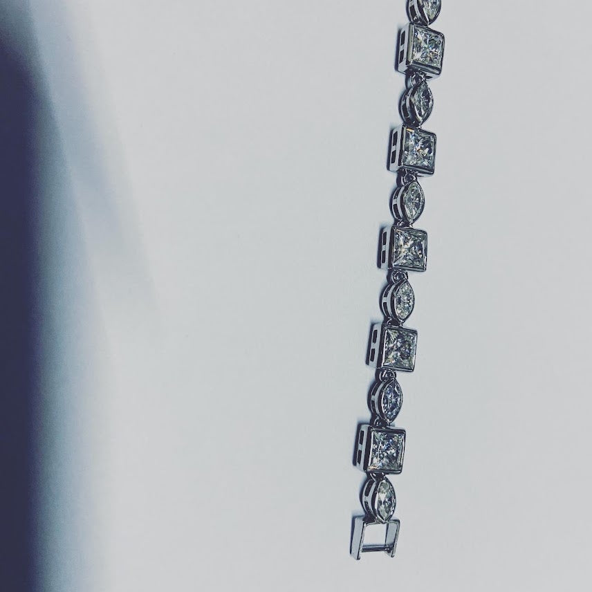 NEARLY WHITE MOISSANITE TENNIS BRACELET