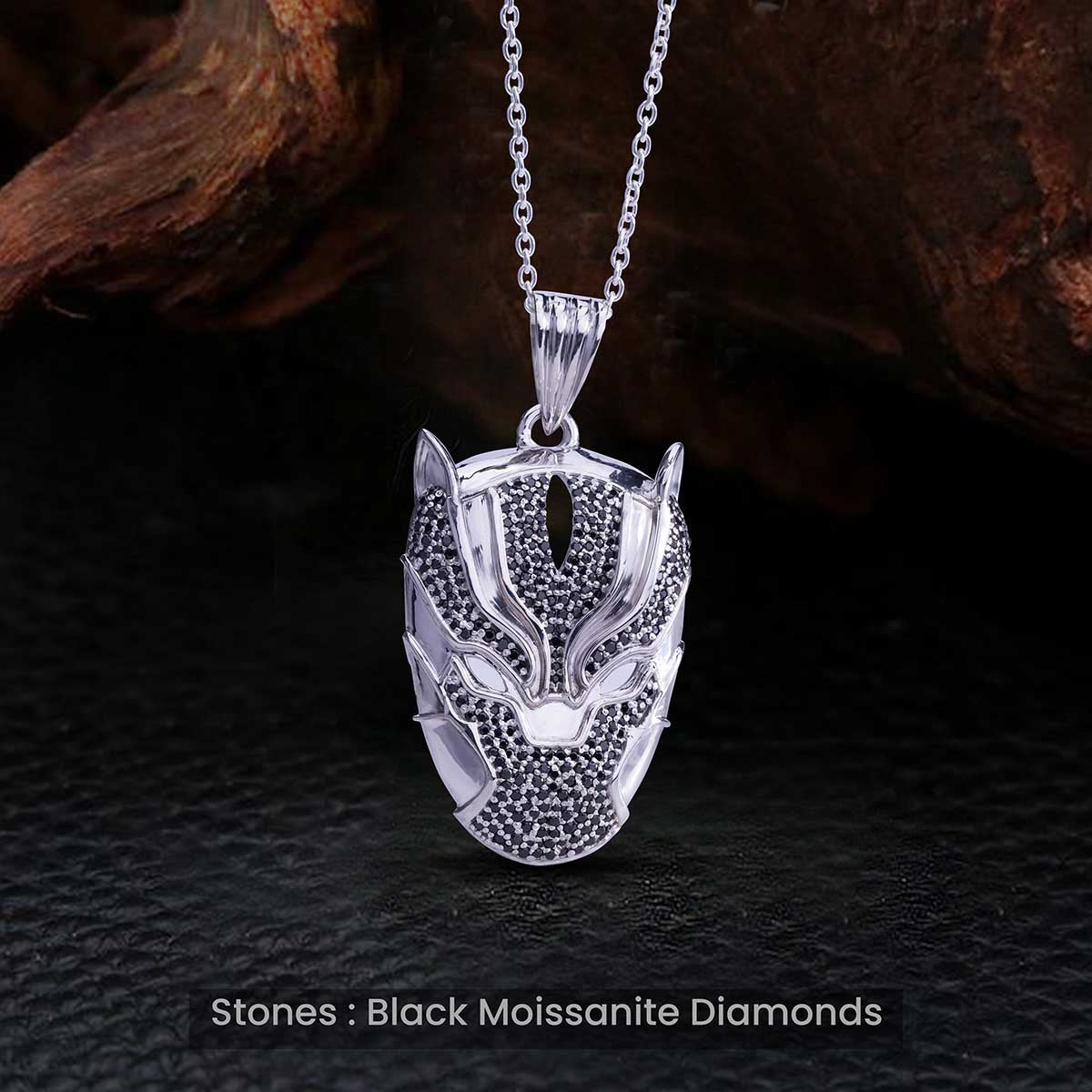 panther pendant with Black moissanite gemstones on a dark textured background