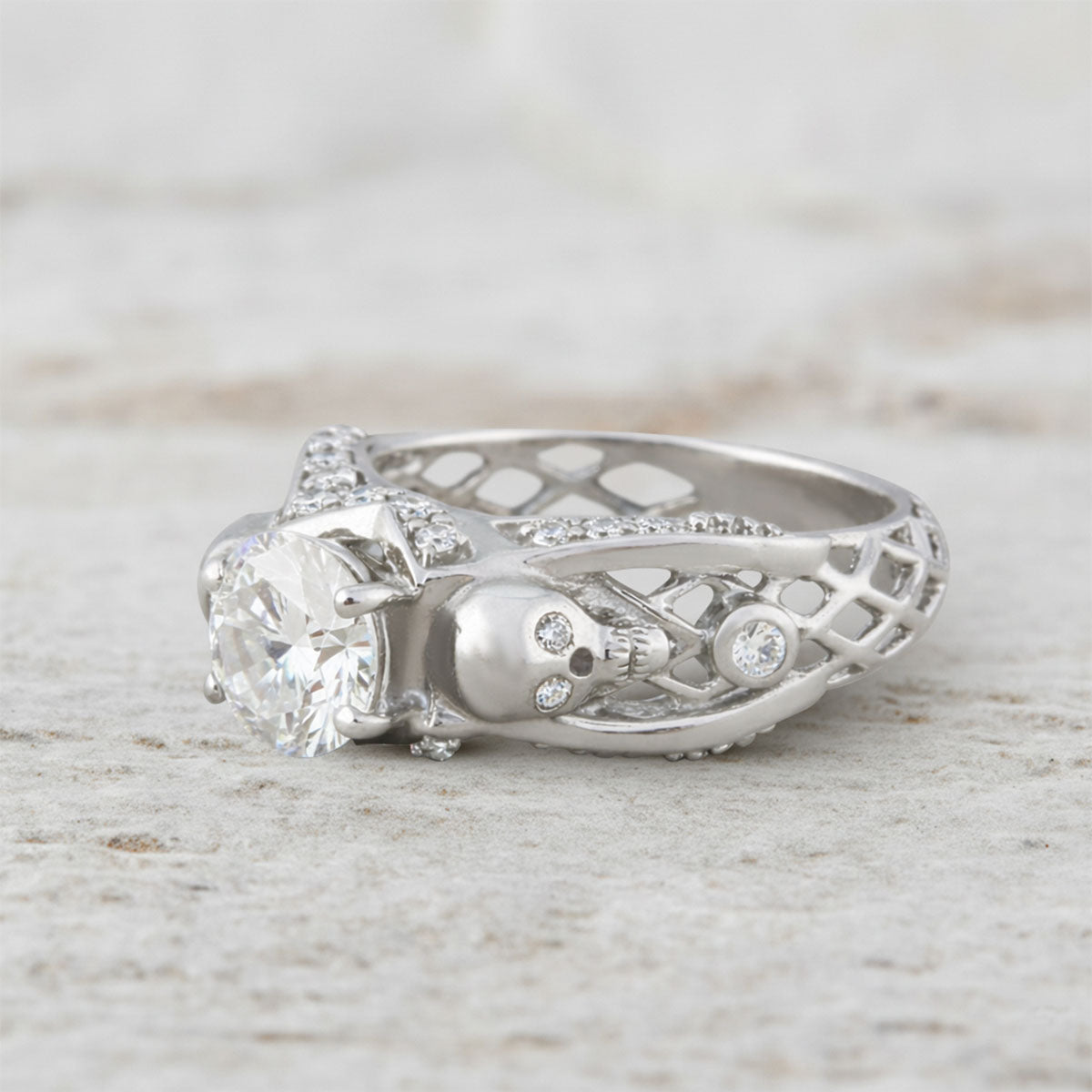 Diamond skull ring with criss cross mesh design in sterling silver or white gold