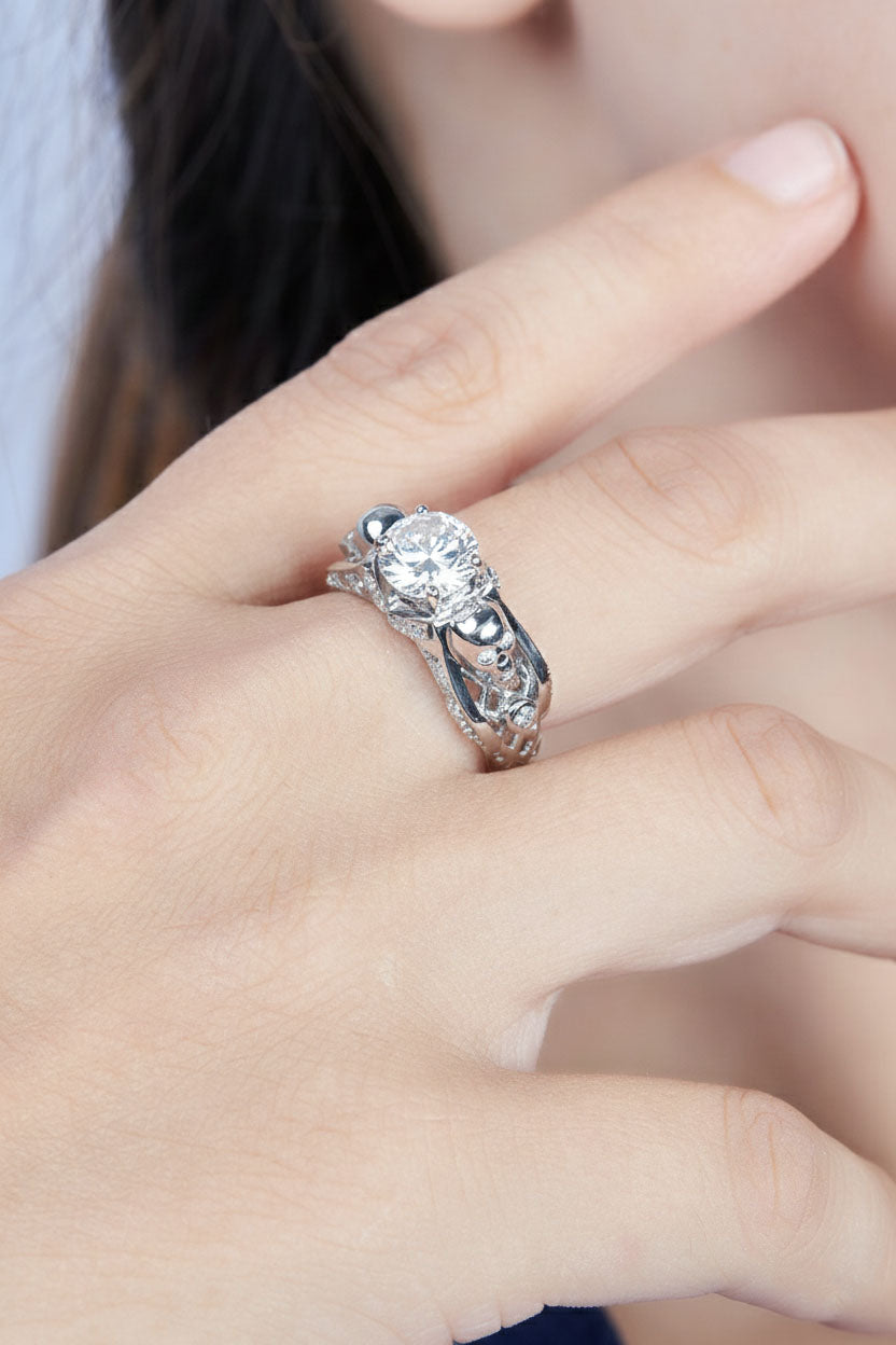 Diamond skull ring on a woman's finger