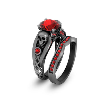Black skull ring with red gemstones and matching stacking wedding band bridal set in gun metal finished sterling silver 