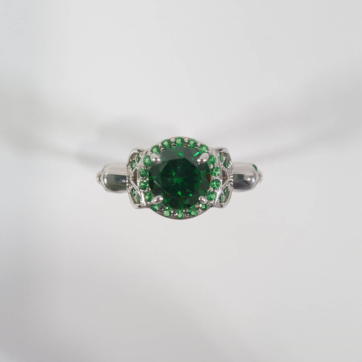 HALO EMERALD SKULL PROMISE RING