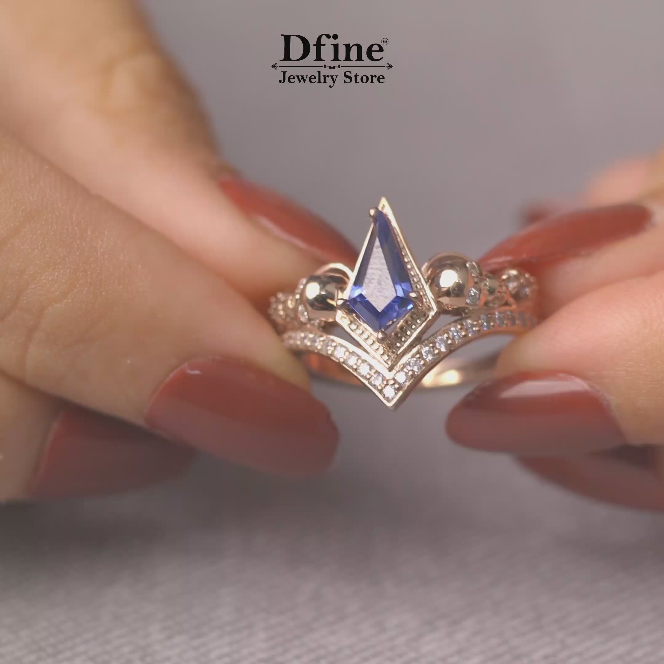 Rose gold skull statement ring with kite cut blue gemstone 