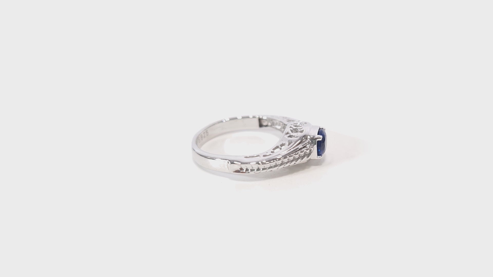Sapphire engagement ring with filigree art deco design in sterling silver or white gold