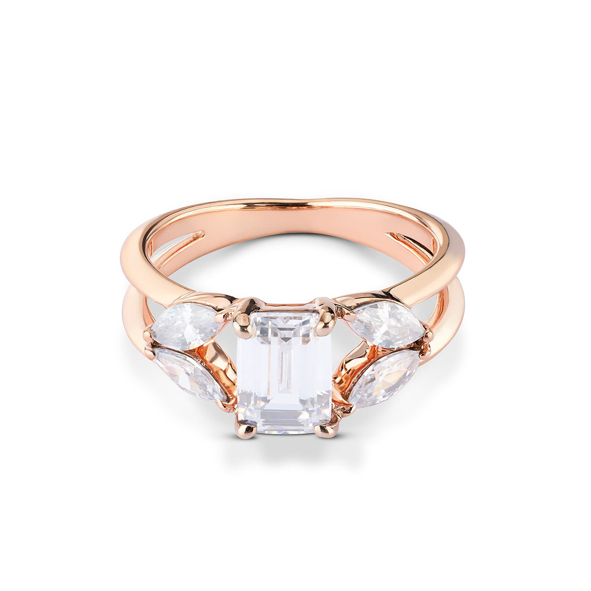Sophisticated white metal ring with an emerald-cut centerpiece and decorative marquise side stones.