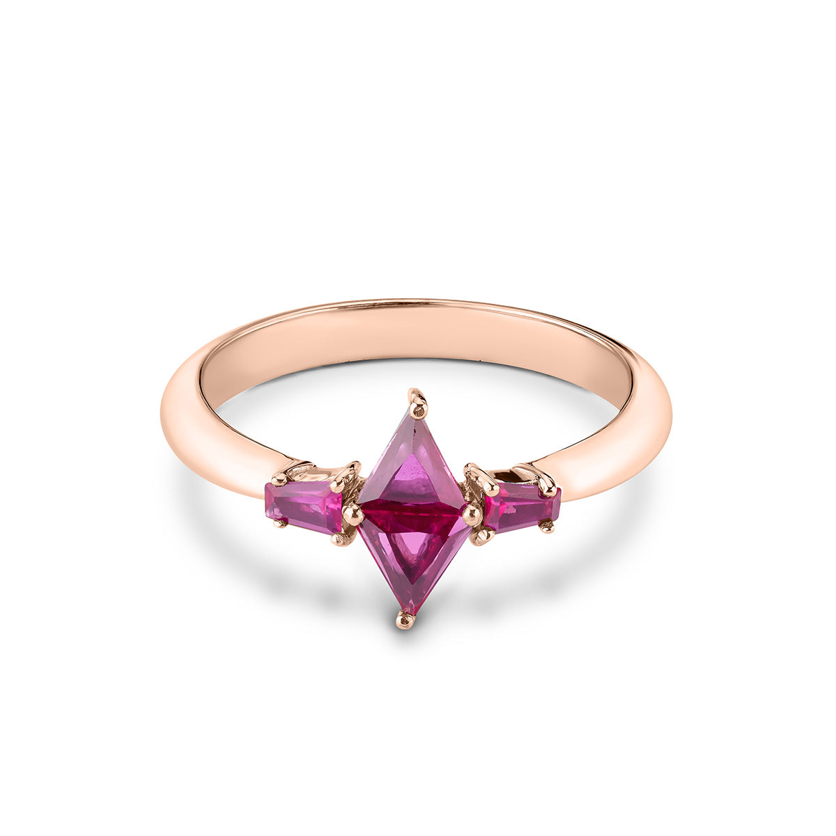 Promise ring showcasing a kite-shaped ruby or pink sapphire in a modern prong setting