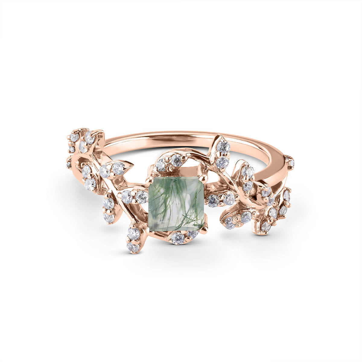 Nature-inspired silver ring with a square-cut green moss agate and diamond-encrusted leaf motifs.