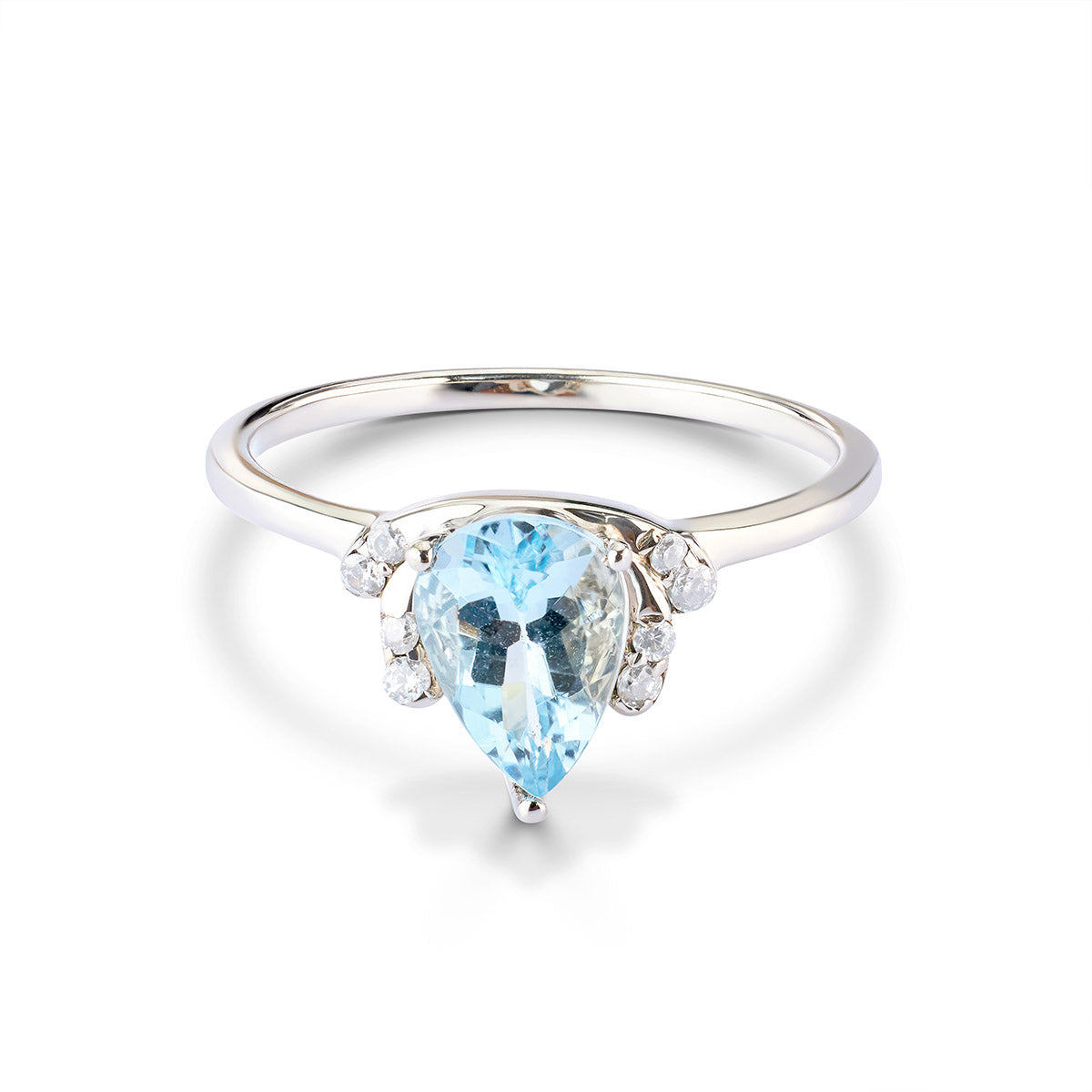 Silver ring with a pear-shaped blue gemstone on a white background