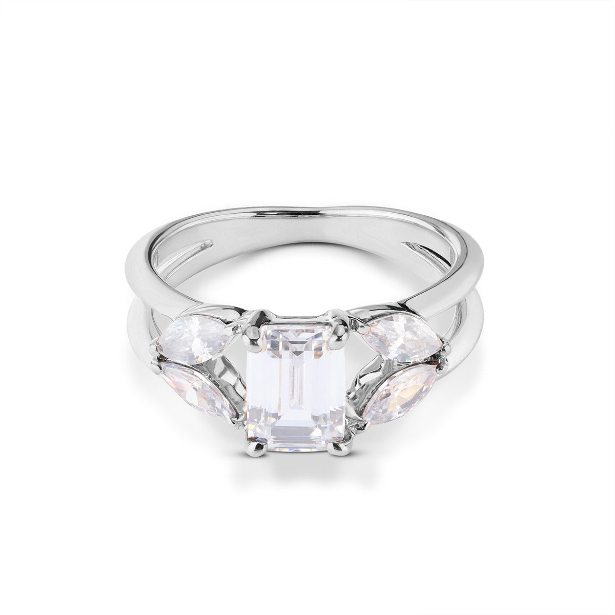 Silver split-shank ring featuring a central emerald-cut clear gem flanked by marquise-cut stones.